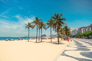 Palms on Copacabana Beach next to landmark mosaic in Rio de Janeiro, Brazil
